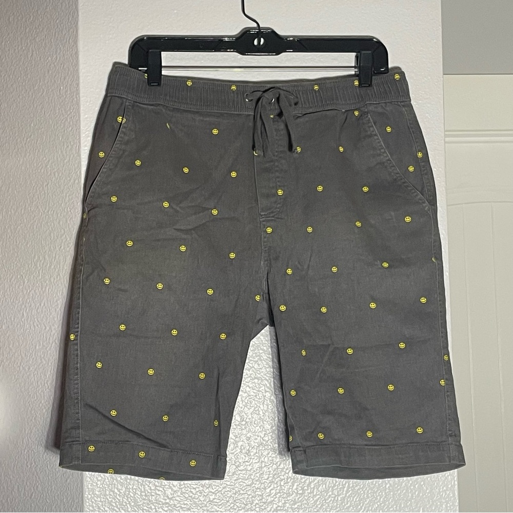 Modern Culture Board Shorts with smiley faces with x eyes 😵 pattern.